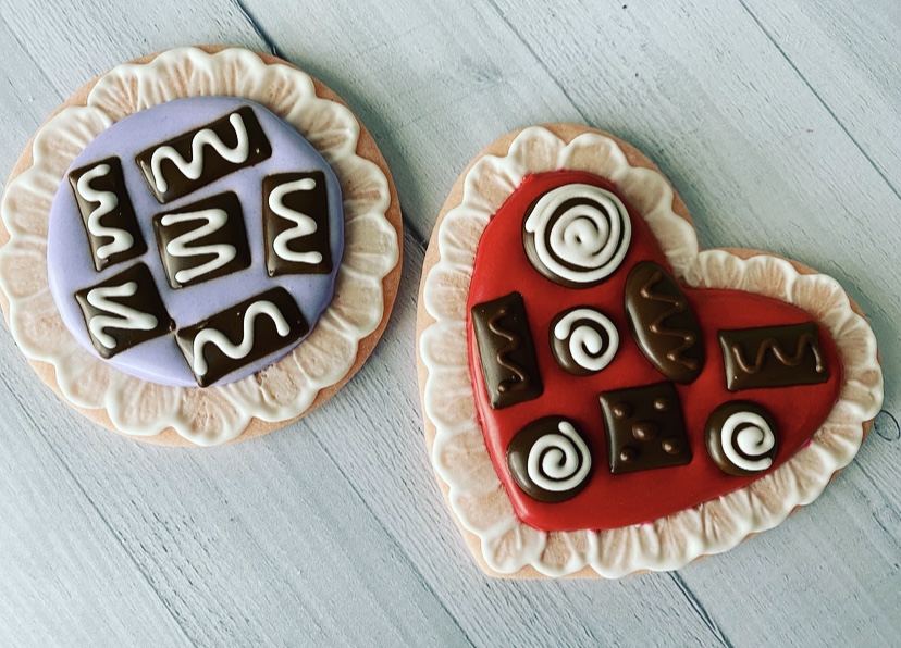 Box of chocolate cookies decorated